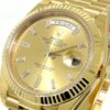 Falso Rolex Day-date 40mm Ouro Amarelo Champanhe Baguete Mostrador Diamante 228238