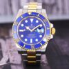 Relógio falso Rolex Submariner em aço e mostrador azul em ouro amarelo 18k 116613